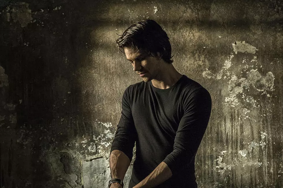 Dylan O’Brien Gets a Gun (and a Beard?) in New ‘American Assassin’ Photos