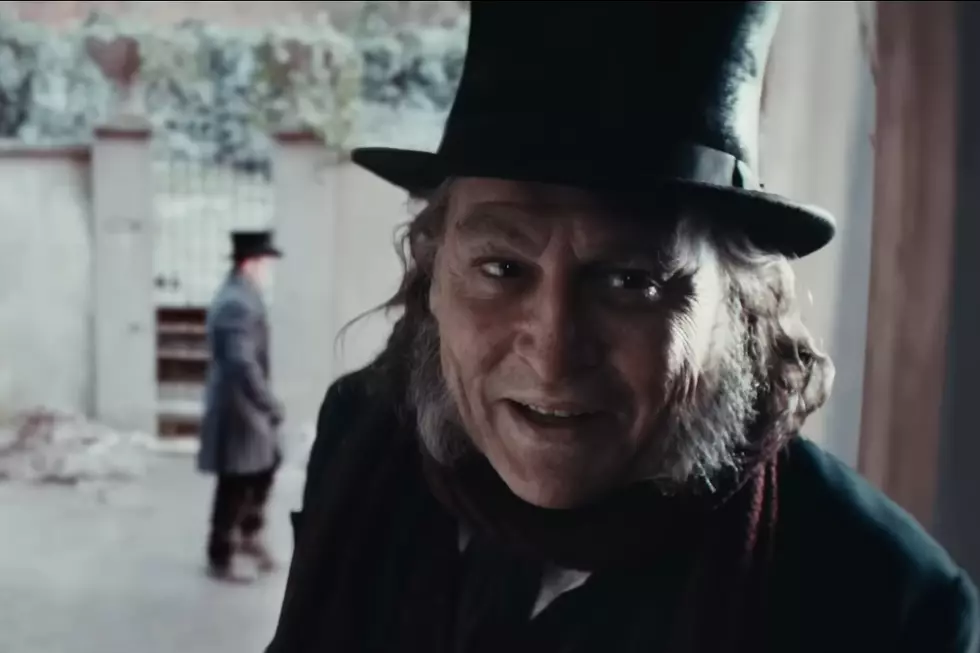 Johnny Depp as Ebenezer Scrooge