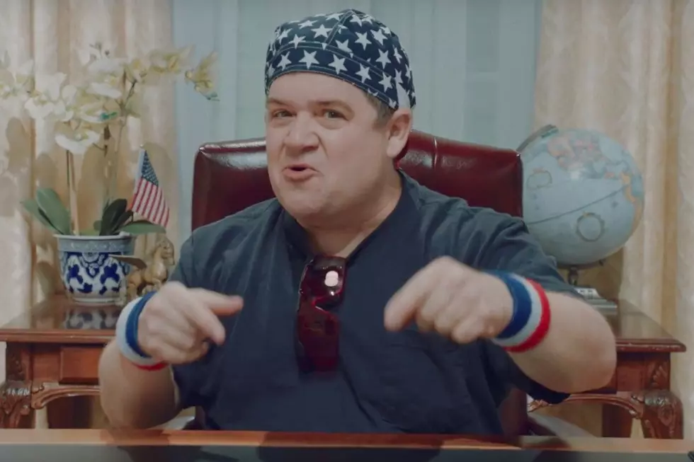 Watch Patton Oswalt Rock the Oval Office in Weezer's New 'I Love the U.S.A.' Video