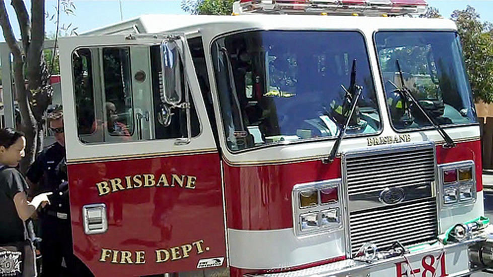 Firemen Dressed in Drag Put Out Burning Car