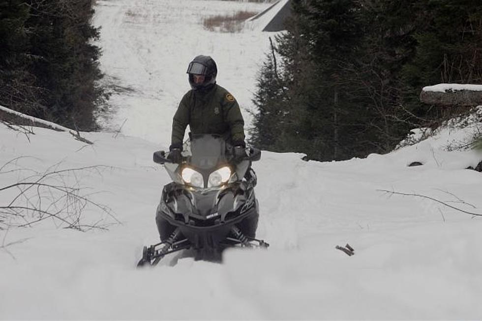 Michigan DNR Park Rangers Rescue Lost Snowmobilers