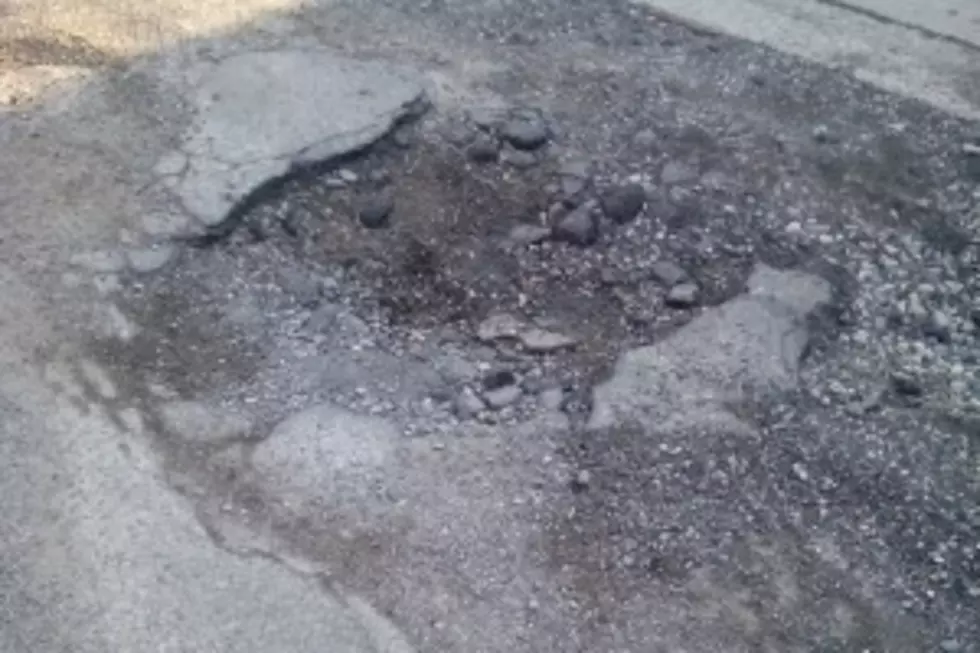 Warmer weather has Kent County workers patching potholes