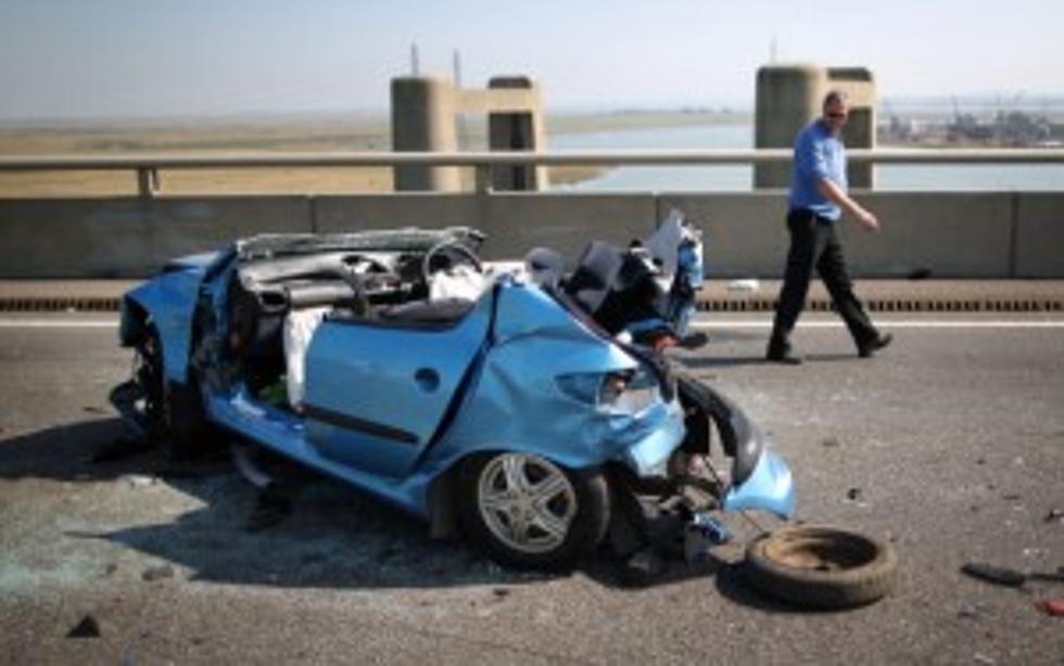 Man Flies Through Windshield in Car Accident and Crawls off Road [Video]