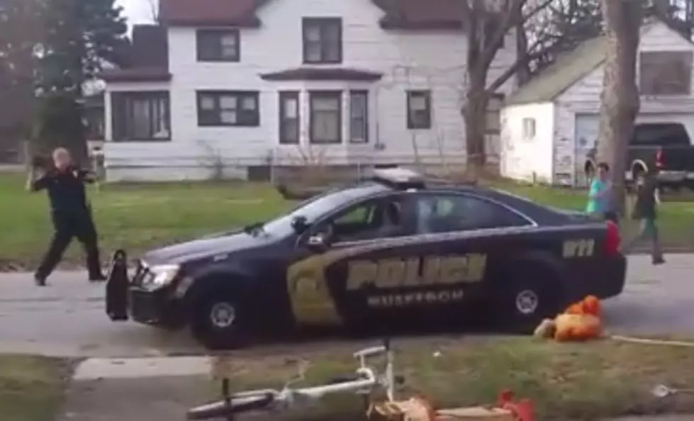 Muskegon Police Officers Caught on Video Playing Football With Kids