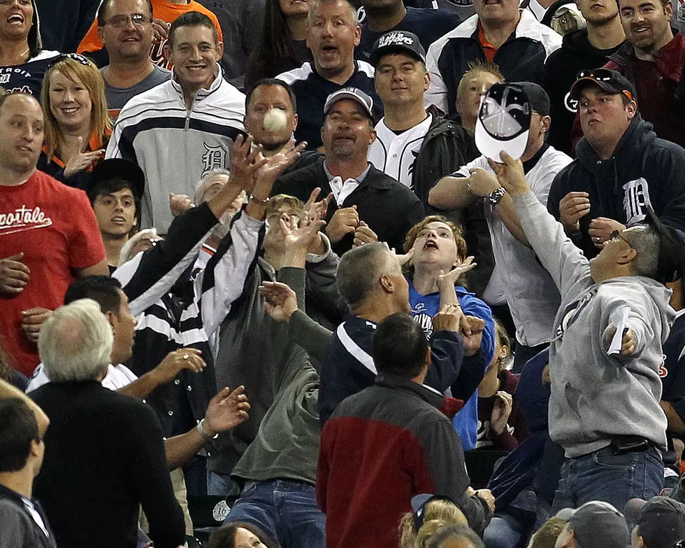 Fan Catches Five Fouls at Detroit Tigers Game, Gives Baseballs to Kids