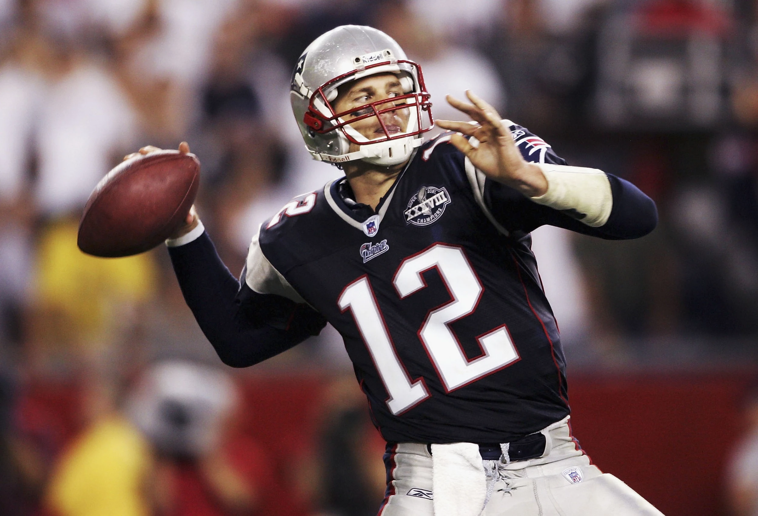 Michigan coach Jim Harbaugh says New England Patriots QB Tom Brady