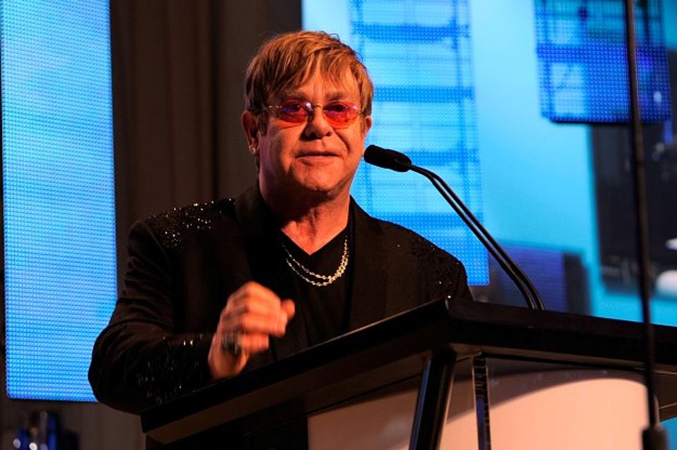 Elton John "Doing Well" After Being Hospitalized