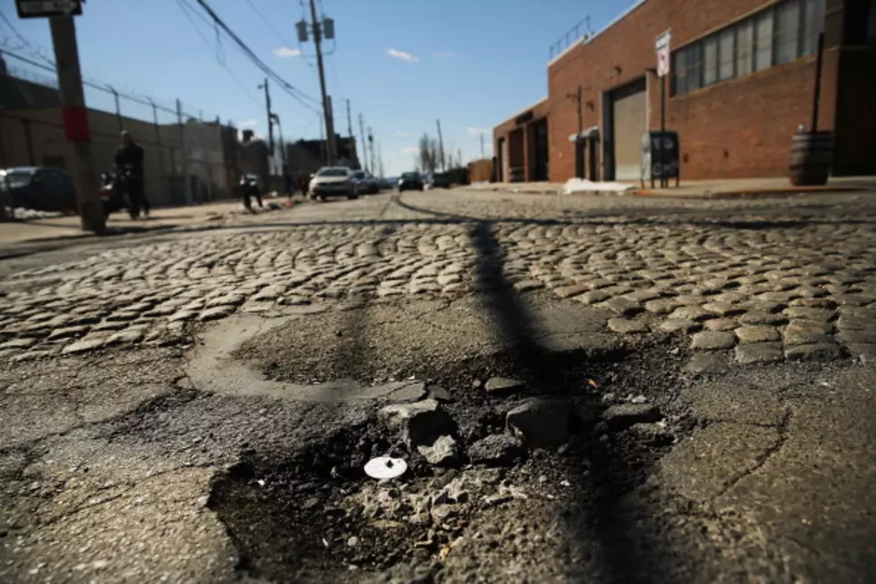 Michigan Man Goes Crazy After Driving Down Pothole Ridden Road [Video]