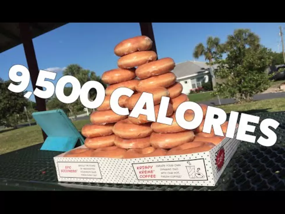 Watch This Petite Woman Scarf Down 50 Krispy Kreme Donuts [Video]