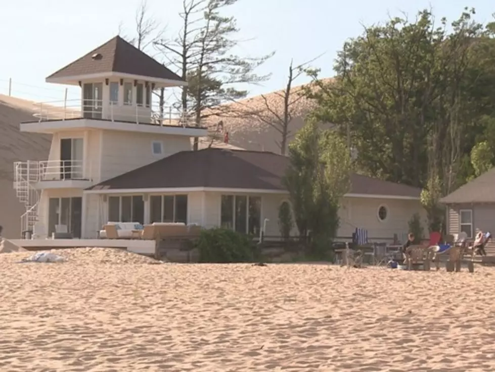 Silver Lake Sand Dune Slowly Eating Cottages [Video]