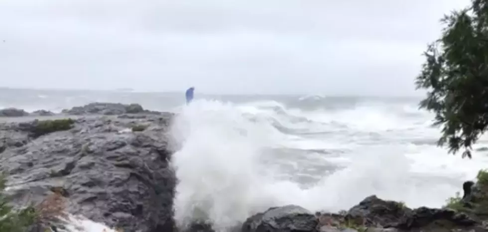 Watch 25 Foot Waves Sweep A Man Into Lake Superior [Video]