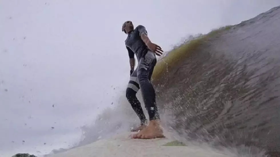 GR Man Surfs Behind The Beaver Island Ferry [Video]