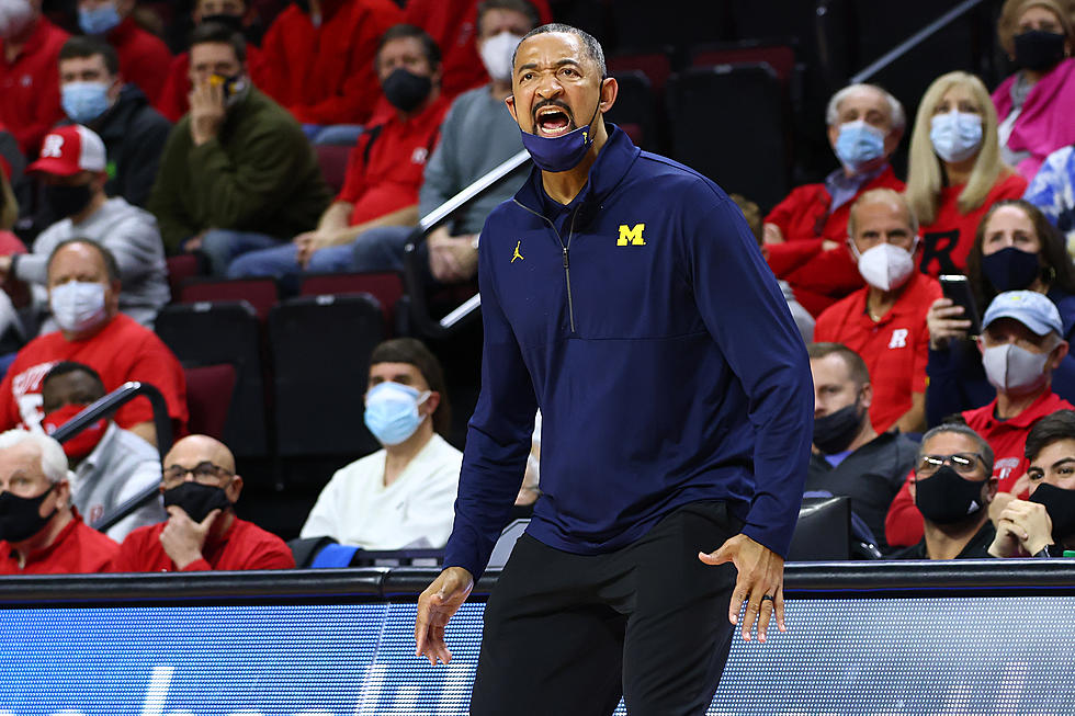 Michigan Coach Suspended As Wisconsin Denies Any Guilt