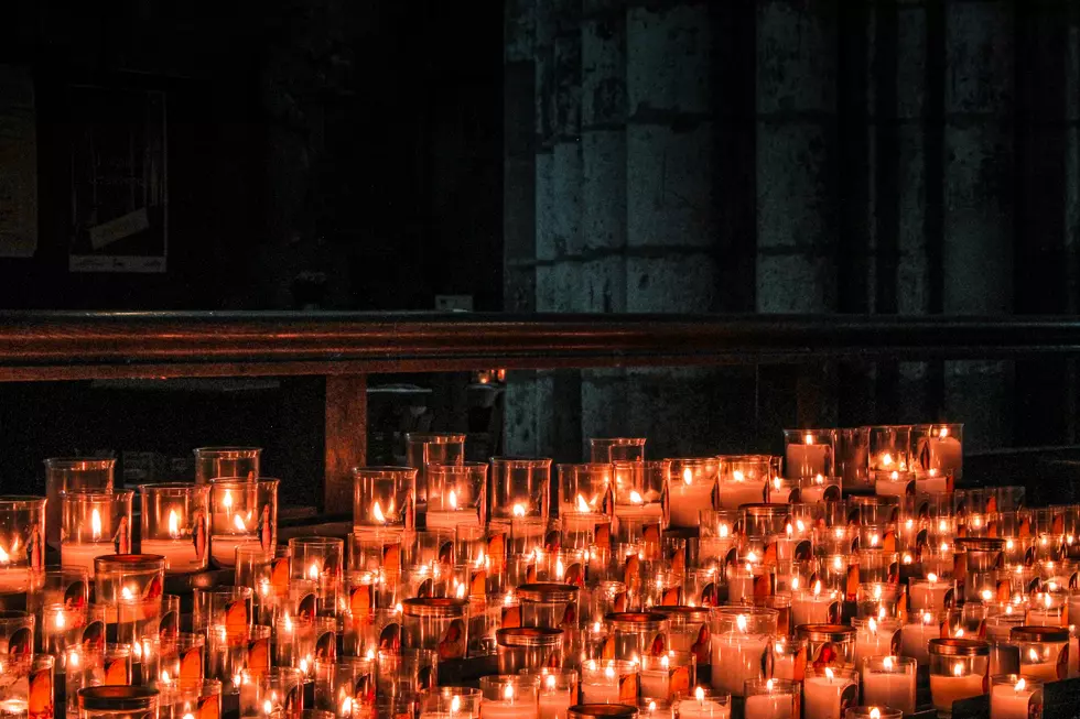 Lighted candles on table