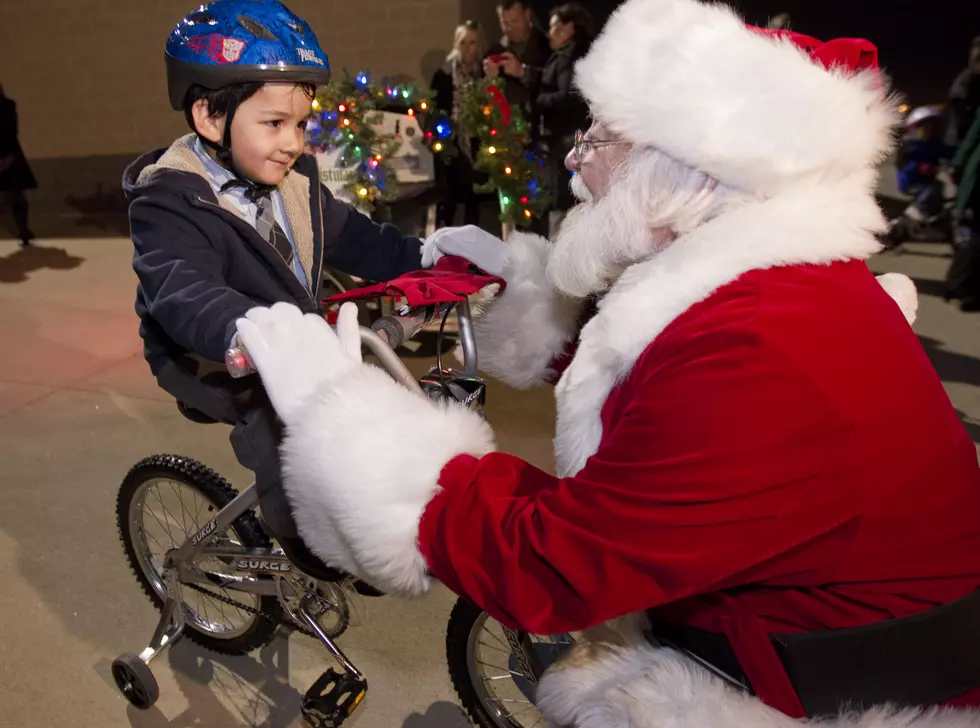 ‘Bikes for Tikes’ Repairs Used Bicycles and Gives Them to Children in Need at Christmas