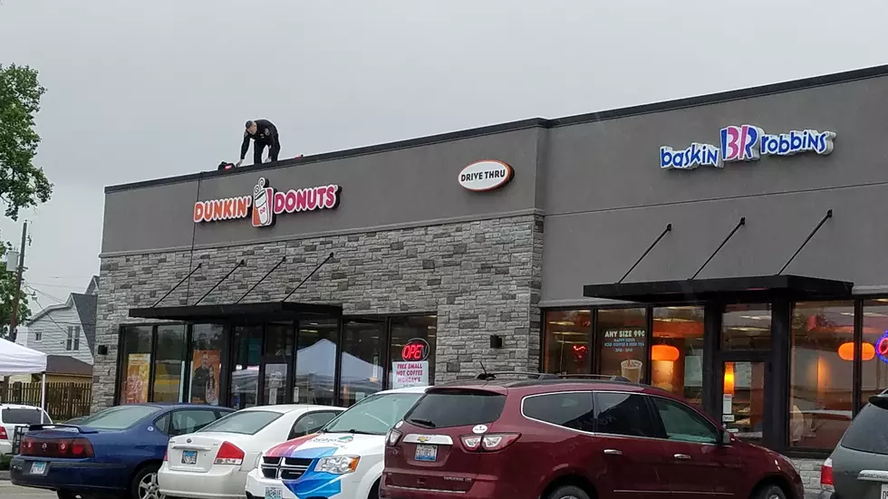 Why Is There A Cop On The Roof Of Dunkin Donuts?