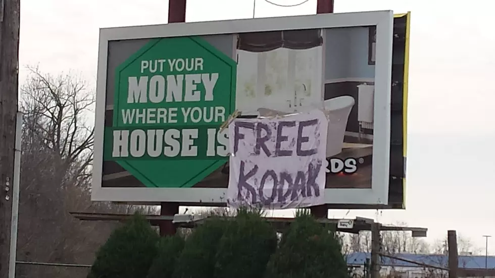 What’s With the ‘Free Kodak’ Sign on Broadway?