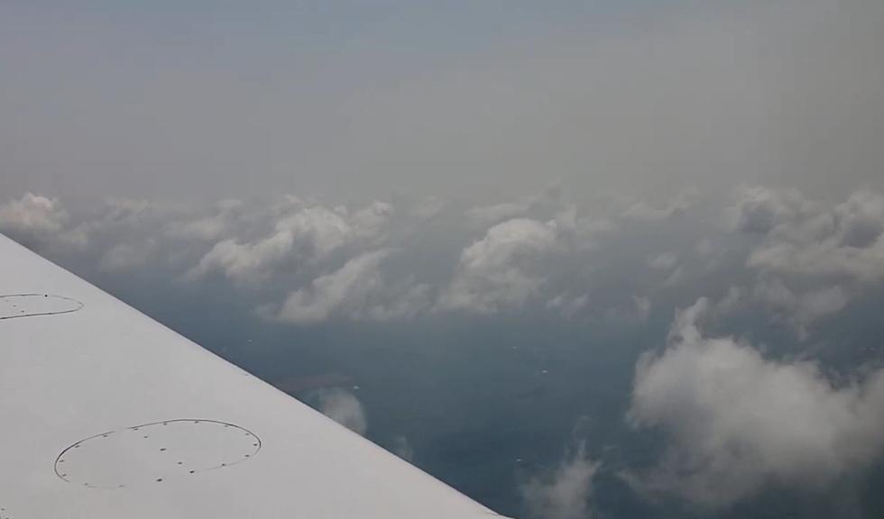 Airline Passenger Shares Video of Wildfire Smoke Heading towards Michigan