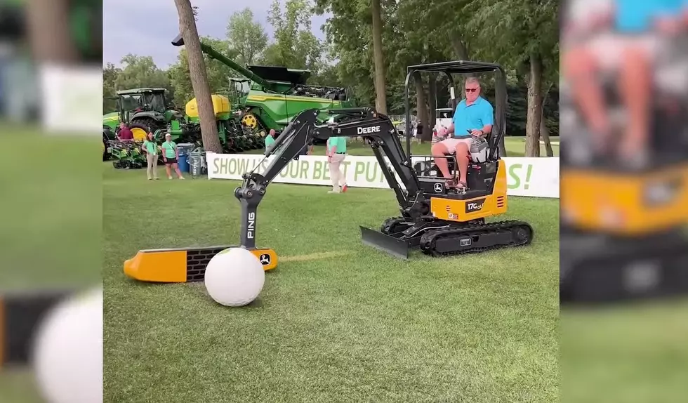 Watch a True Illinois Genius Sink a Putt with His Tractor