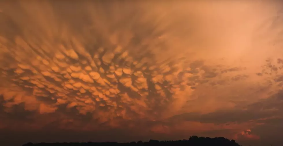 Watch a Haunting Illinois Sunrise with Storm Clouds Everywhere