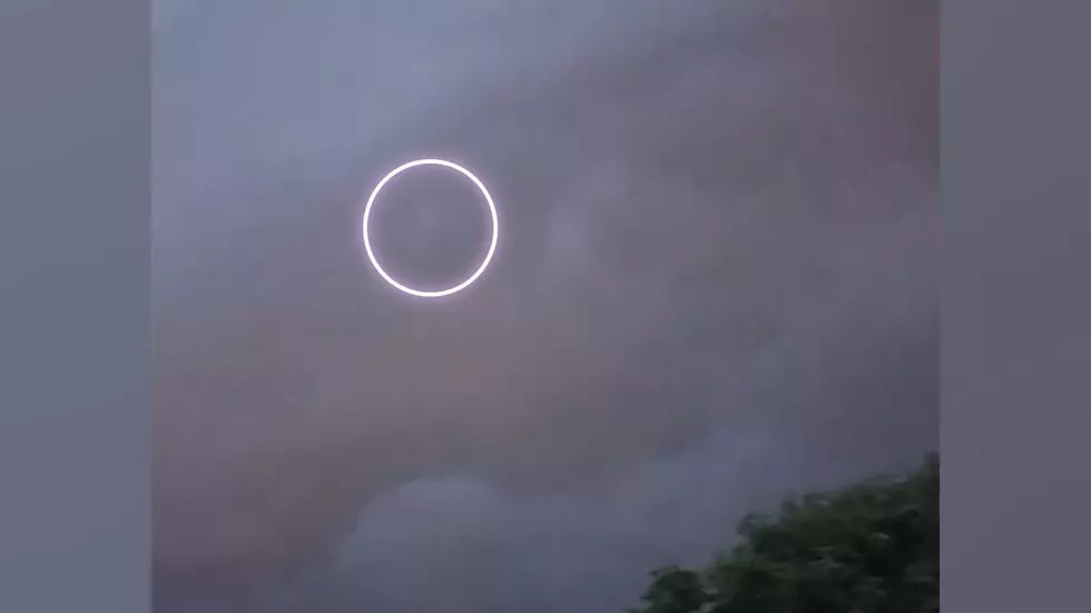 Watch Triangular UFO Disappear into Illinois Thunderstorm Clouds