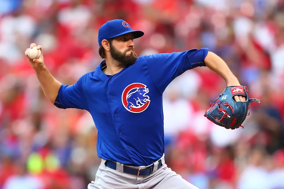 Hammel Leads Cubs with Arm and Bat in 12-3 Win Over Cardinals