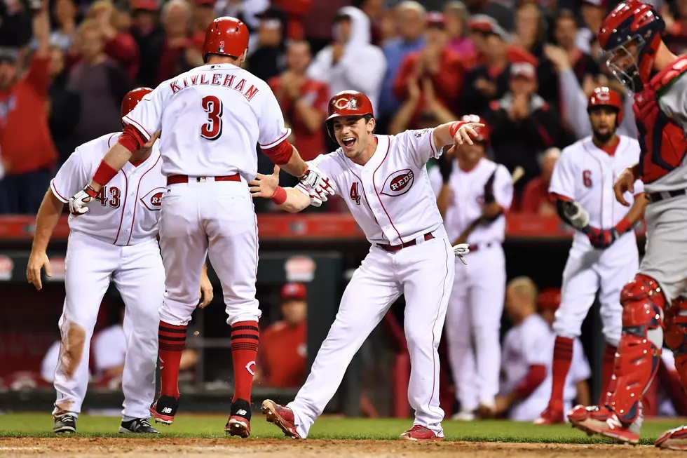 Scooter ends HR spree, but Reds rally to beat Cardinals 6-4