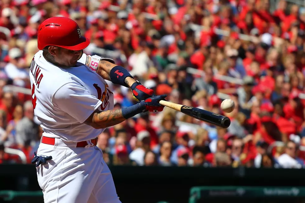 Molina leads Cardinals to 13th straight win over Reds, 6-4