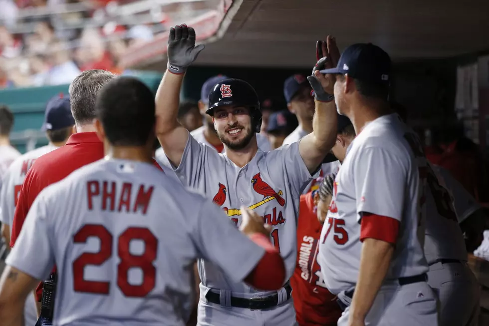 Cards power Weaver with 3 homers in 9-2 win over Reds