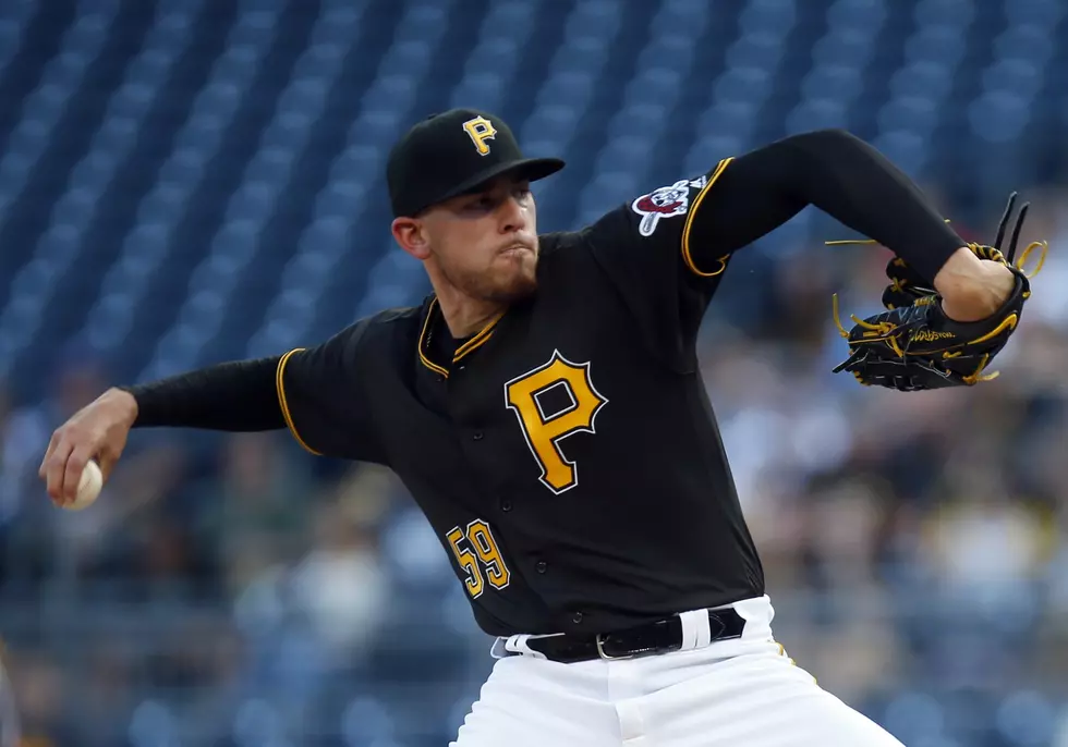 Musgrove uses arm, bat to beat Cards 8-1 in Pirates debut