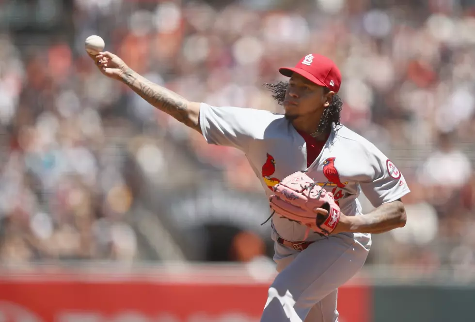 Martinez pitches, hits Cardinals past Giants 3-2