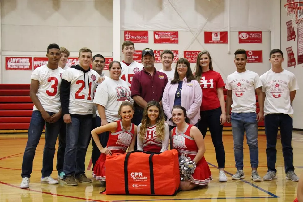 Local Business Donates CPR Training Kit to Sacred Heart School