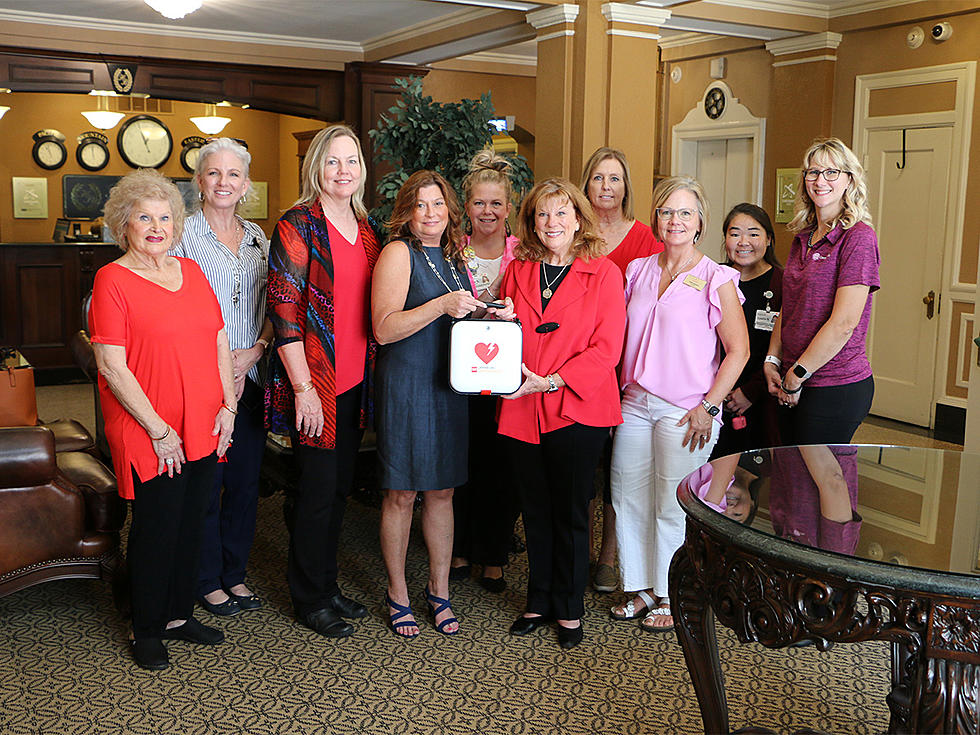 Wear Red For Women Committee Donates AED to Hotel Bothwell