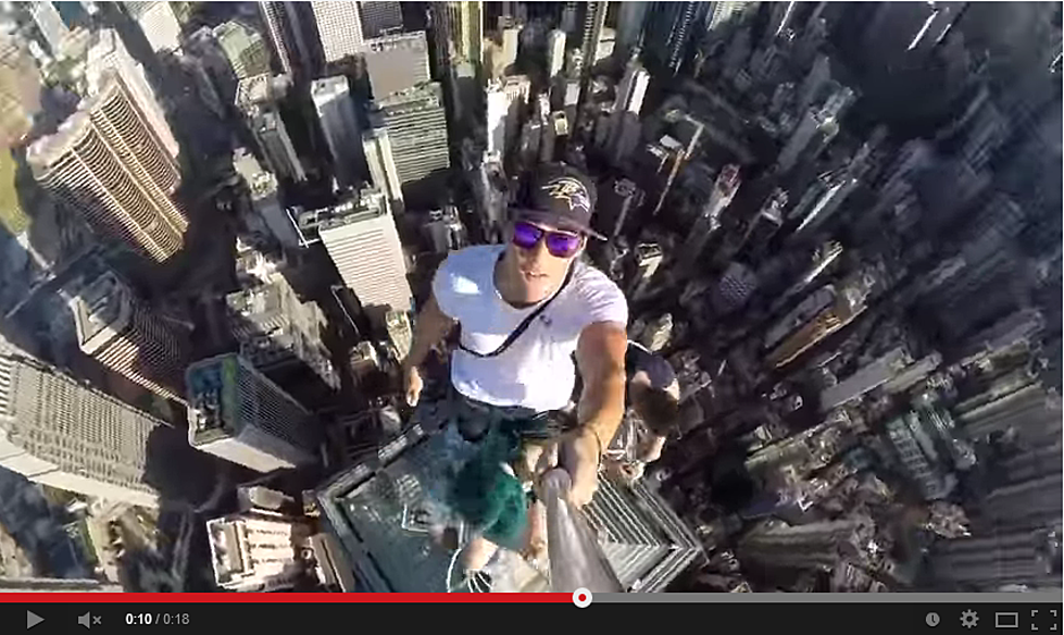 Teen Takes Selfie Atop Hong Kong Skyscraper [Video]