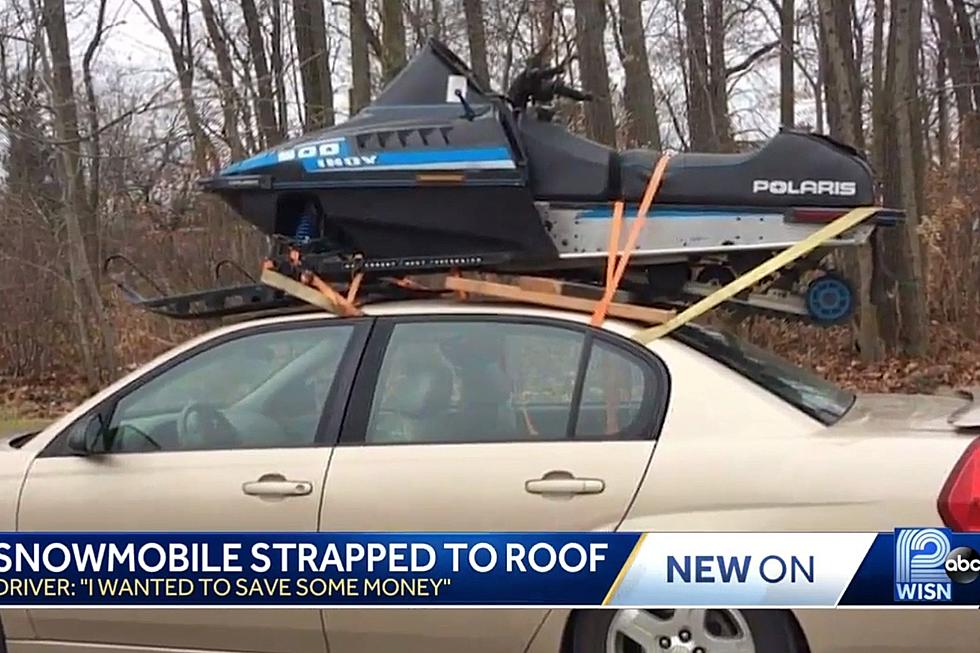 Traveling in Style:  Man Heads to the U.P. With a Snowmobile on His Car [VIDEO]