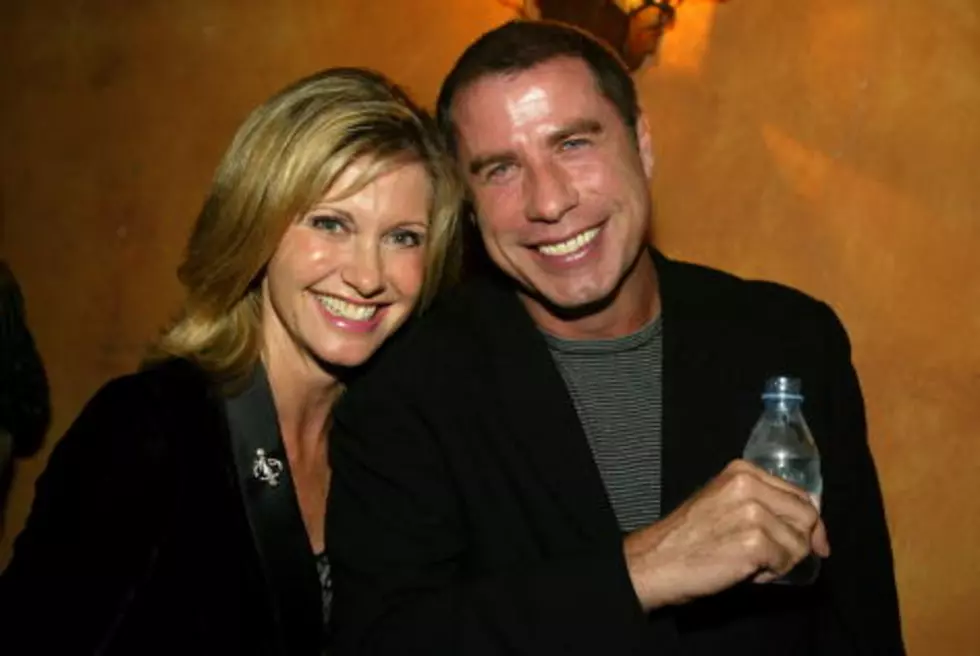 John Travolta and Olivia Newton-John Reunite For Worst Christmas Song Ever [VIDEO]