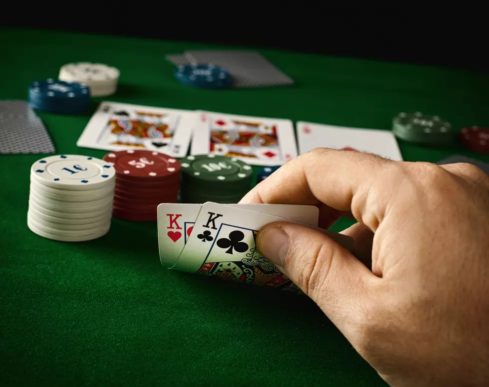 Poker concept with cards on green table