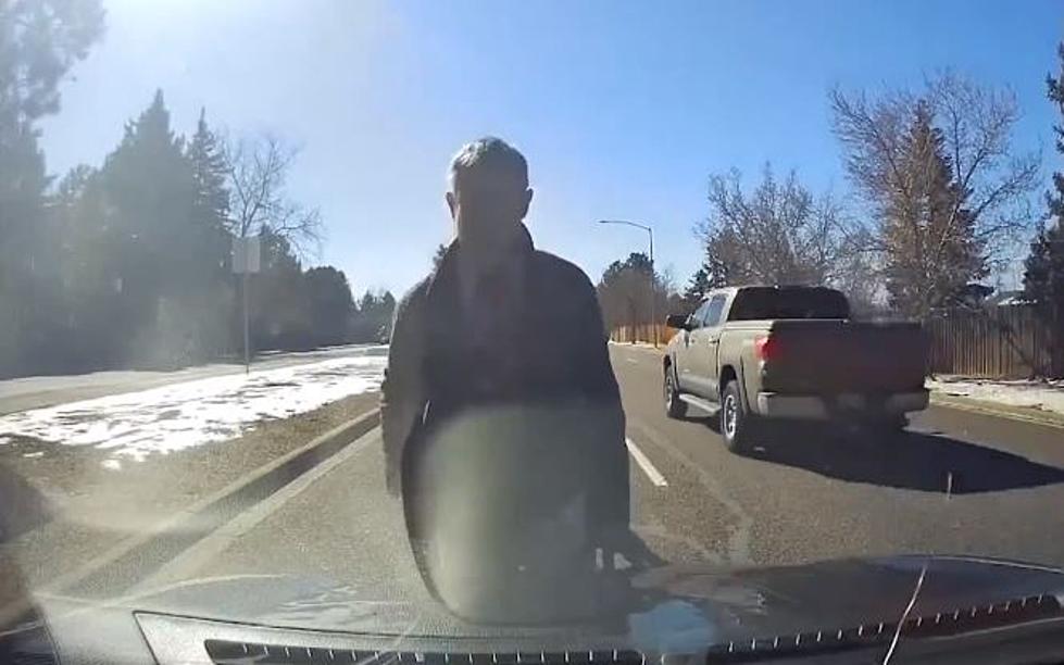 WATCH: Aurora Man Beats Car Right In The Middle Of Traffic