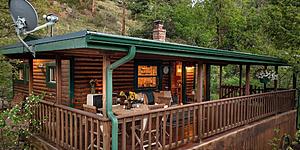 Take a Look at This Rustic Riverside Colorado Log Cabin For Sale