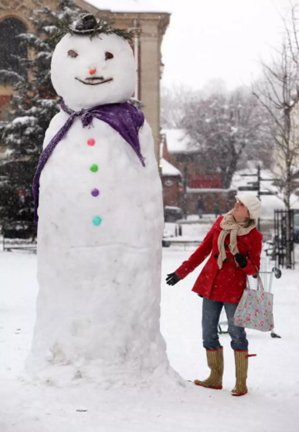 Frozen Godzilla of The Upper Midwest: Giant Snowman Towers Over Minnesota