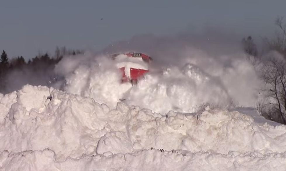 See What It Looks Like When a Train Plows Snow Off the Tracks