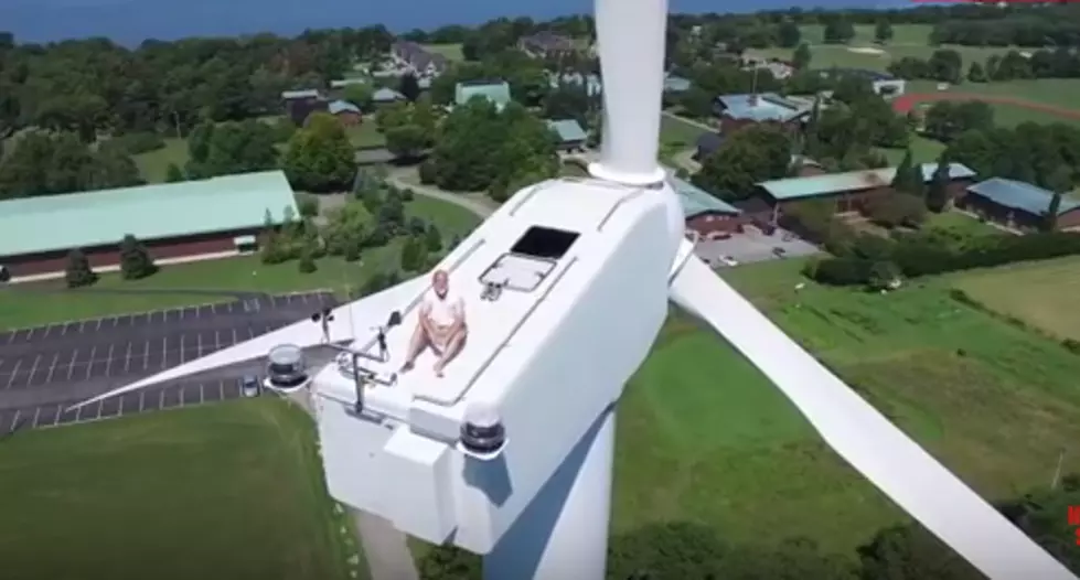 Man Spotted Sunbathing on Top of a Wind Turbine