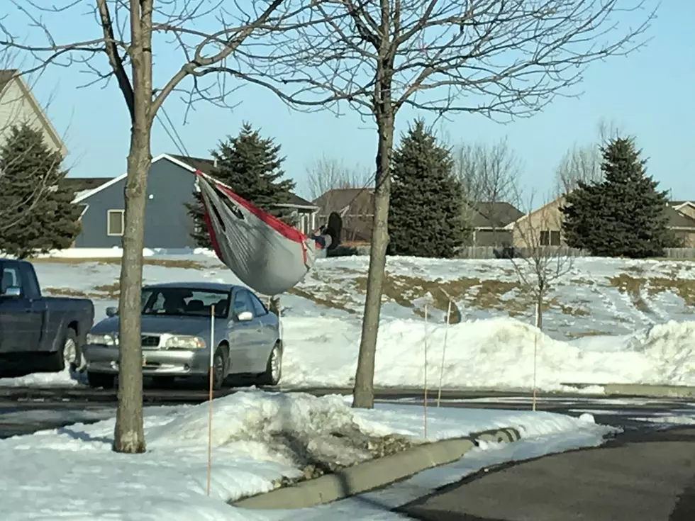 South Dakota Man Excited For Spring Puts Hammock Up in February