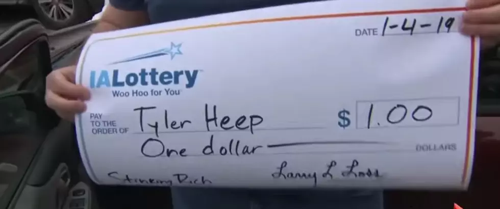 Iowa Man Cashes in $1 Lottery Winnings