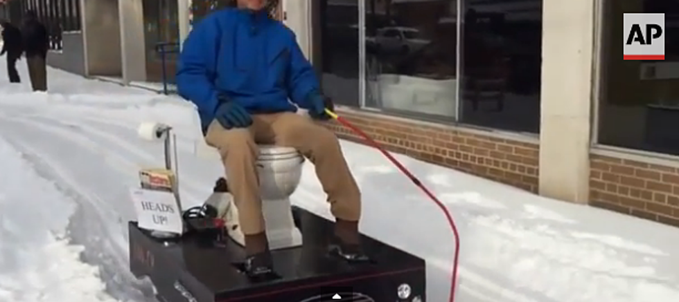 Heads Up! Man Tears Down Street on Motorized Toilet Snow Plow. You Read That Right.