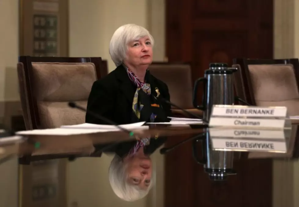 Yellen Faces Challenges as Fed Trims Bond Buys