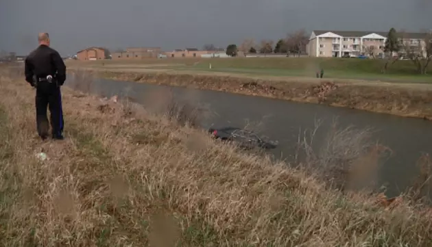 Car plunges into Creek, Rescue Turns Into DWI Arrest