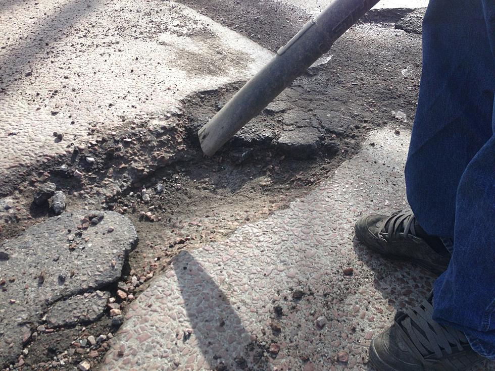 Crews Filling up Potholes