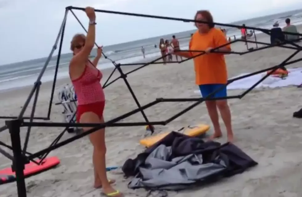 Two Ladies Caught On Video Stealing A Families Beach Canopy.