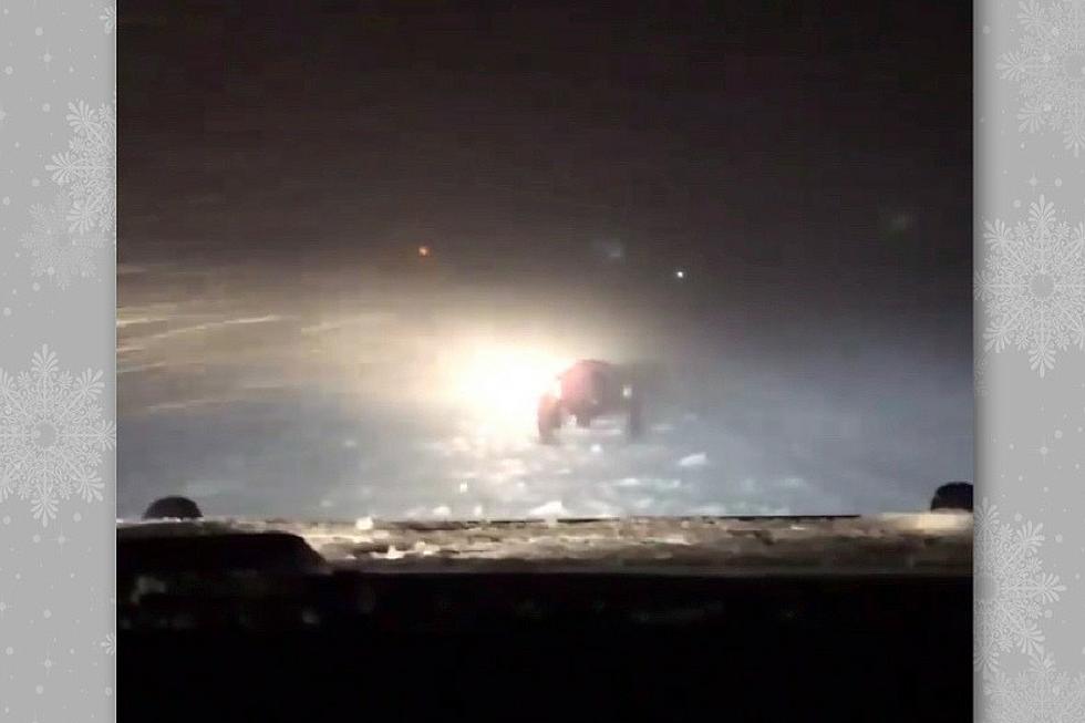 South Dakota Highway Patrol Trooper Does Pushups In Blizzard